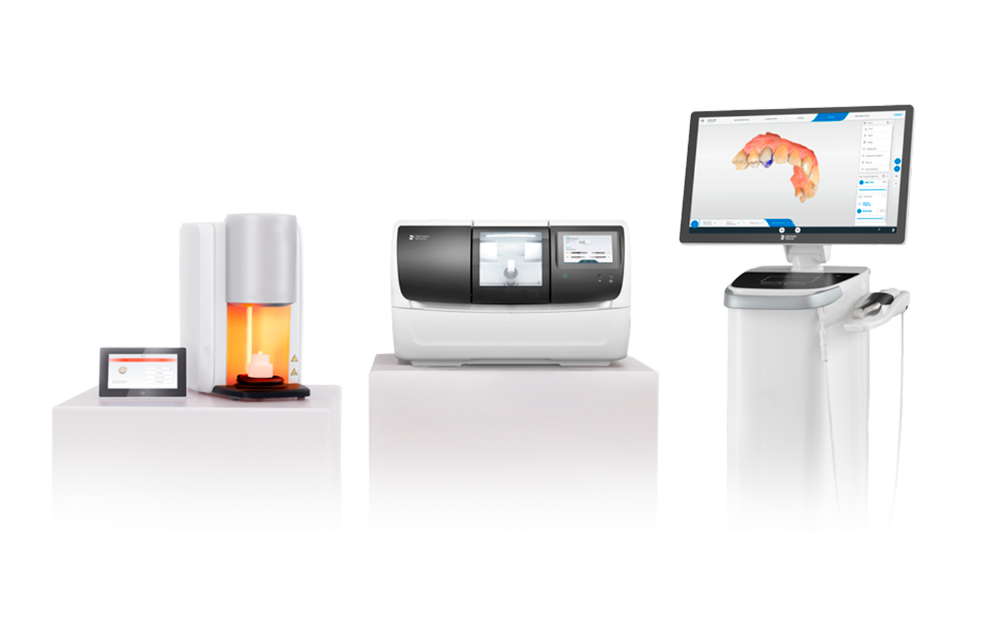 Equipamentos do Fluxo Digital Chairside: forno de cristalização, fresadora e scanner com o desenho digital do sorriso na tela